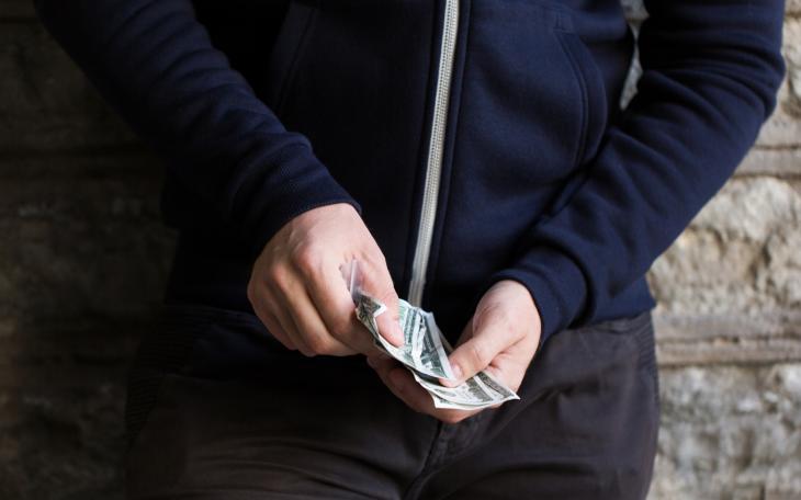 Dealer Counting Cash