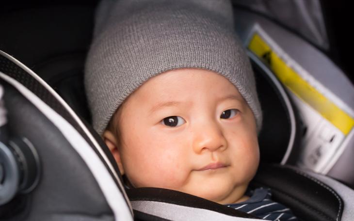 Baby in Car Seat | DepositPhotos