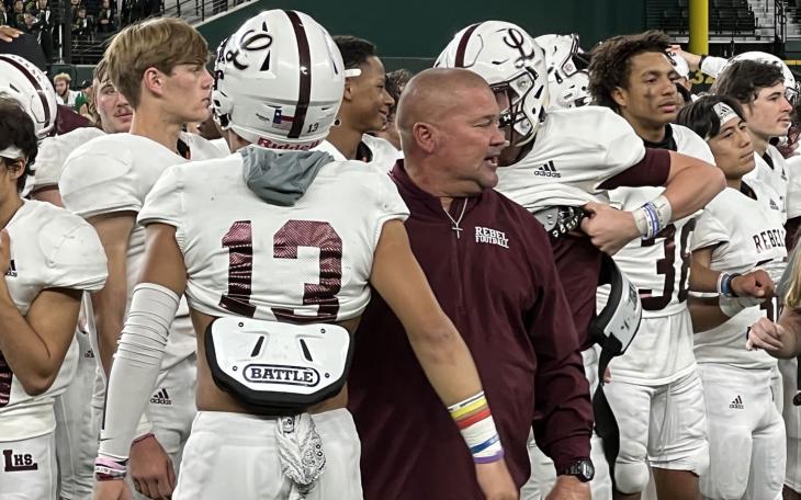 Midland Legacy Head Coach Clint Hartman with his team following 42-7 loss to Southlake Carroll