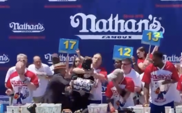 Joey Chestnut Wins, Slams Protester to Ground
