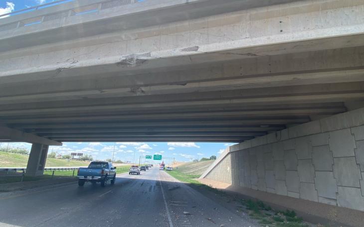 Excavator on Trailer Hits Main St. Bridge (Contributed/TxDOT)