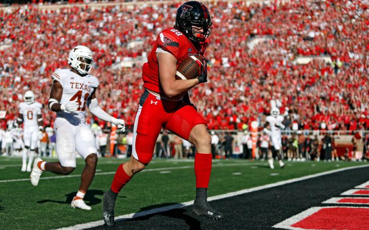Texas Tech's Baylor Cupp (88) scores a touchdown during the second half of an NCAA college football game against Texas, Saturday, Sept. 24, 2022, in Lubbock, Texas. (AP Photo/Brad Tollefson)