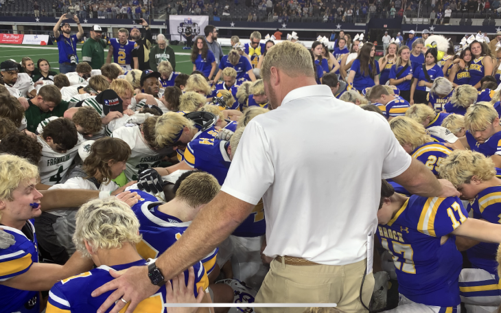 Coach Billy Mathis lets the Players lead Brock and Franklin in Prayer following the Championship Game