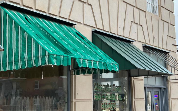 The old awning and a representation of the new steel awnings to be installed soon.