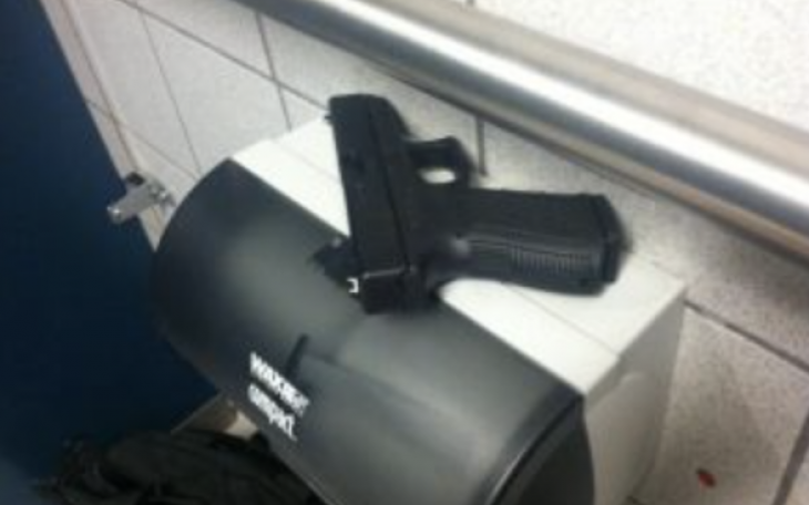 Gun in Bathroom