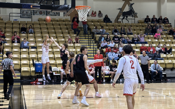 Christoval's Jaron Slaton launches a 3-point shot.