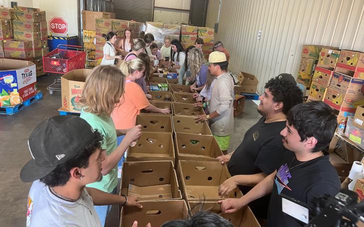 Three sororities and four fraternities sent volunteers from all classes — freshmen through seniors — to help the food bank for three hours on a Thursday evening.