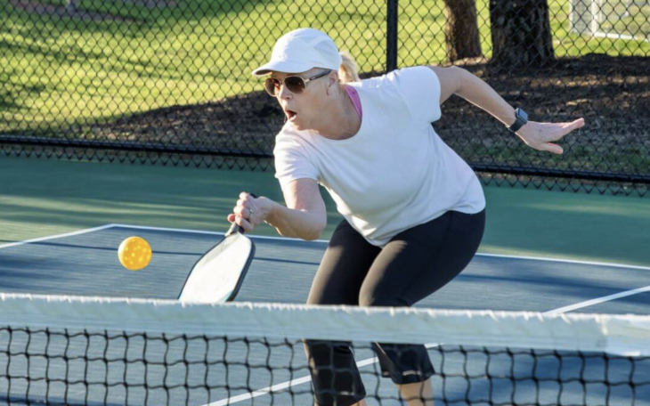 Woman Playing Pickleball, an up and coming sport in the United States