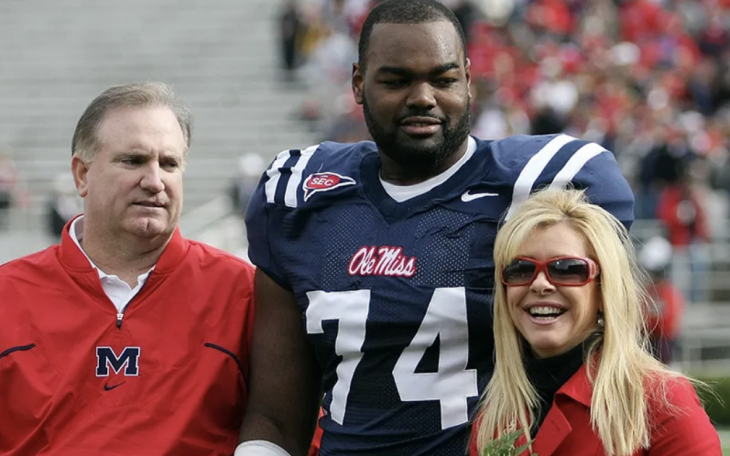Michael Oher with Sean and Leigh Ann Tuohy