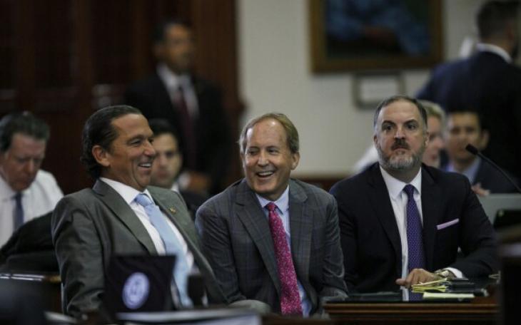 Tony Buzbee (left) with Paxton and associate defense attorney Mitch Little. (AP)