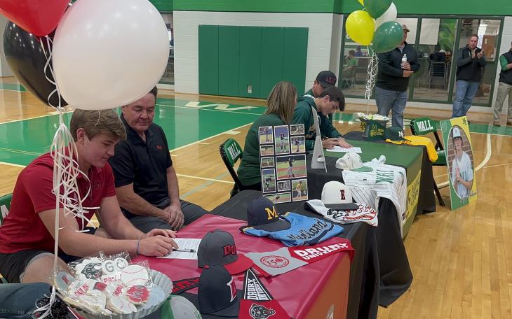 Wall Hawks Dylan Gidney (left) and Augden Hallmark (right) sign to play baseball at the next level