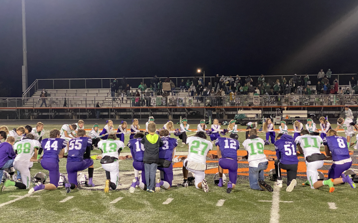 Irion County Hornets and May Tigers Pray After their Bi-District Matchup.