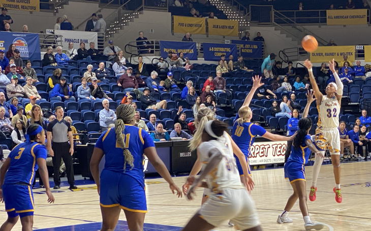 Tayjanna McGhee-Pleasant hits a three against St. Mary's.