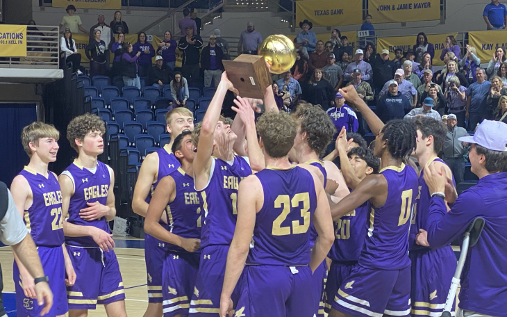 The Sterling City Eagles lift the gold ball after beating Miles, 48-38.
