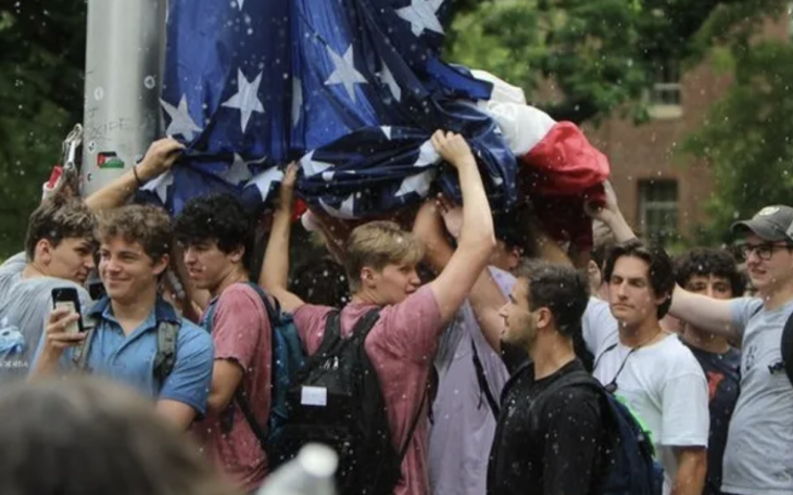 Pi Kappa Phi defending the American Flag