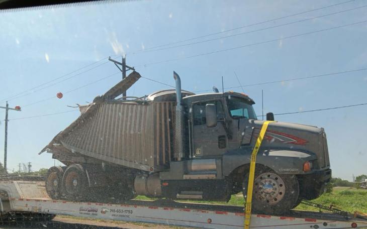 MILES, TX — This afternoon, a truck tractor towing a semi-trailer had its trailer cut in half after a train collided with it.
