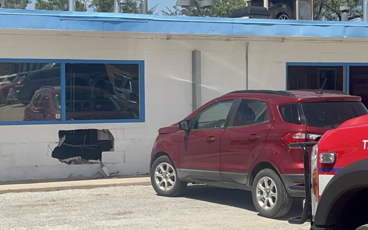 A vehicle crashed into a laundromat Thursday afternoon, leaving a hole in the building.