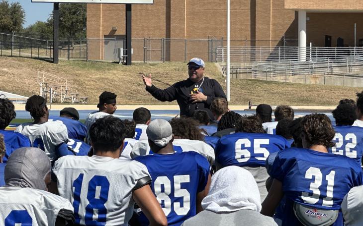 Angelo State Head Coach Jeff Girsch breaks out the Rams after practice.