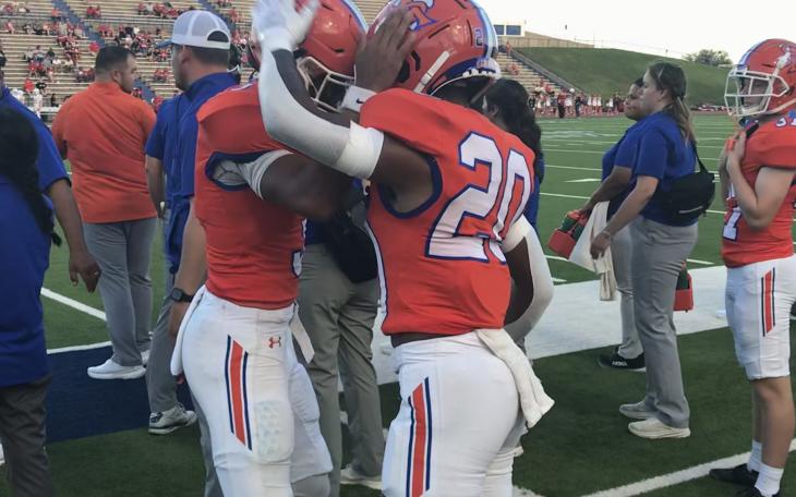 Central quarterback Christian English and running back Elijah Allen celebrate after a touchdown against Belton at San Angelo Stadium on Friday, Sept. 20, 2024.