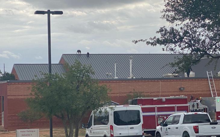 Law enforcement officers on the roof of River Crest Hospital during a special call response in San Angelo, TX.