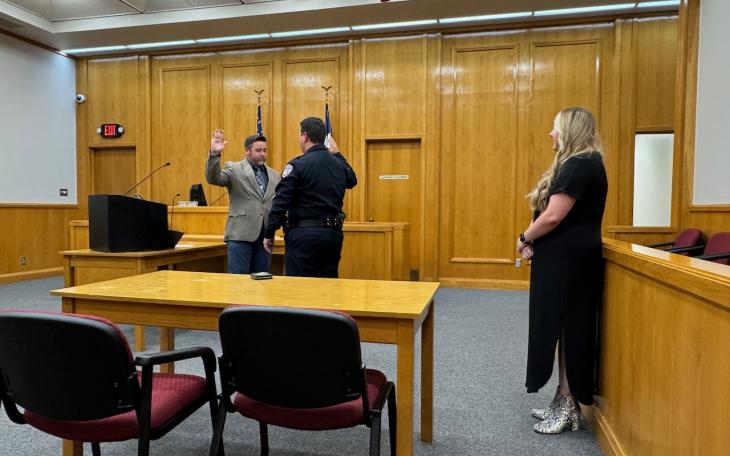 San Angelo Police Chief Travis Griffith administers the oath of office to Israel Bilbo as Bilbo's wife, Deyna, looks on. Bilbo joined the police force on Nov. 1, 2024.
