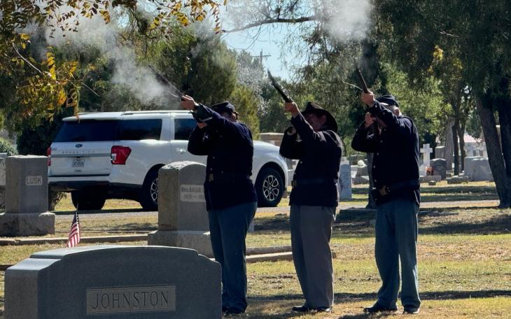 The ceremony featured a traditional three-volley rifle salute performed by Fort Concho reenactors using Civil War-era rifles.