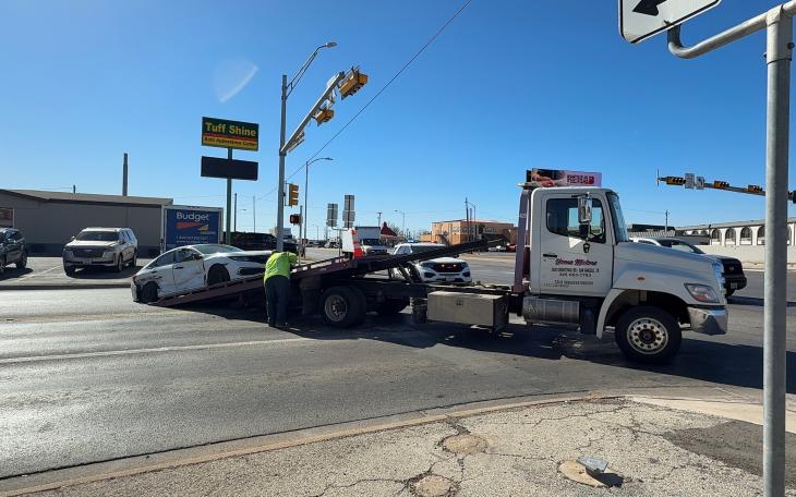A crash involving a white Honda Civic and a red Dodge Ram temporarily shut down the intersection of South Bryant Boulevard and West Avenue L late Wednesday night.