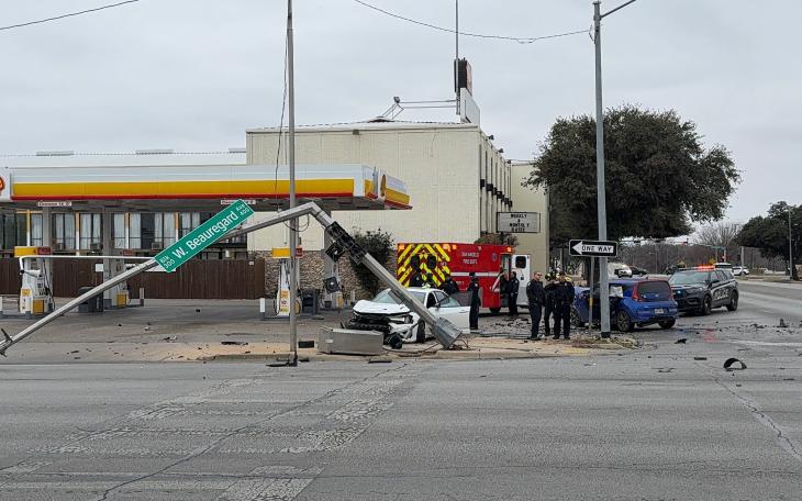 A two-vehicle crash at one of San Angelo’s busiest intersections Wednesday afternoon knocked down a traffic signal.