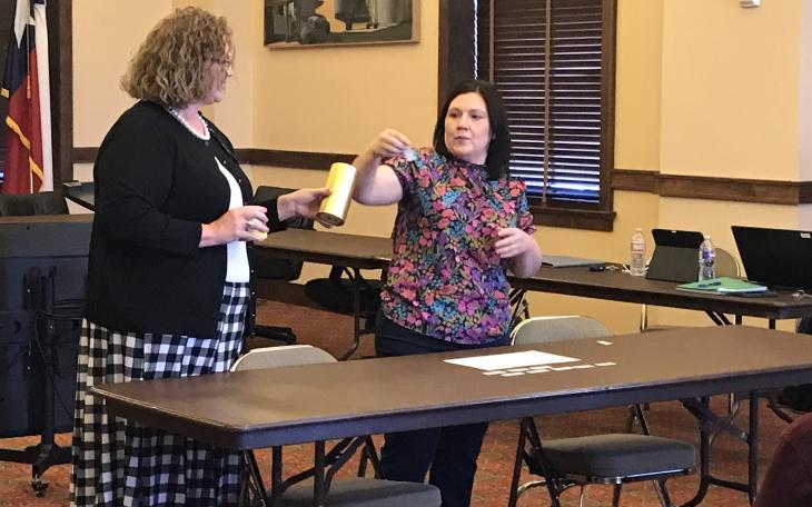 City Clerk Heather Stastny draws names to determine the ballot order for San Angelo’s upcoming May 3 election during a drawing held on Monday, Feb. 24.