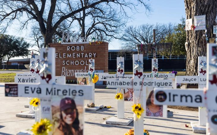 Memorial crosses are seen in 2024 outside Uvalde's Robb Elementary School, where 19 students and two teachers were killed two years earlier.