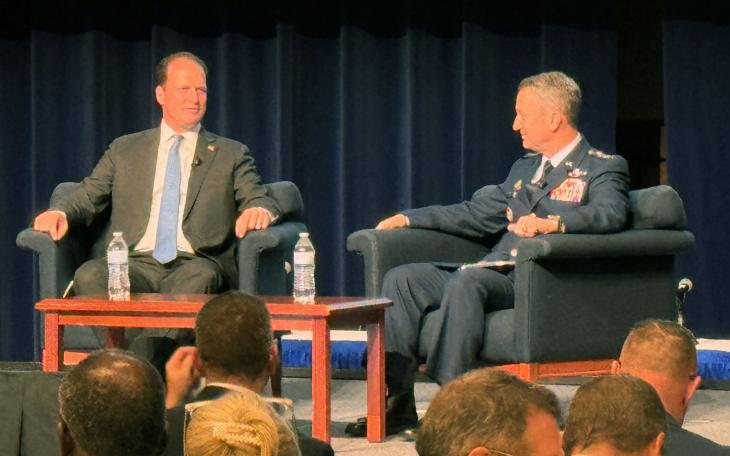 Congressman August Pfluger (left) interviews Chairman of the Joint Chiefs of Staff General Dan "Razin" Caine at the 2025 West Texas Legislative Summit. 