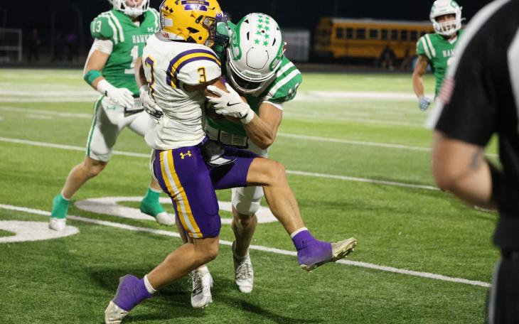 Wall's Levi King tackles Merkel's C.J. Guadarrama during their game Friday, Oct. 10, 2025.