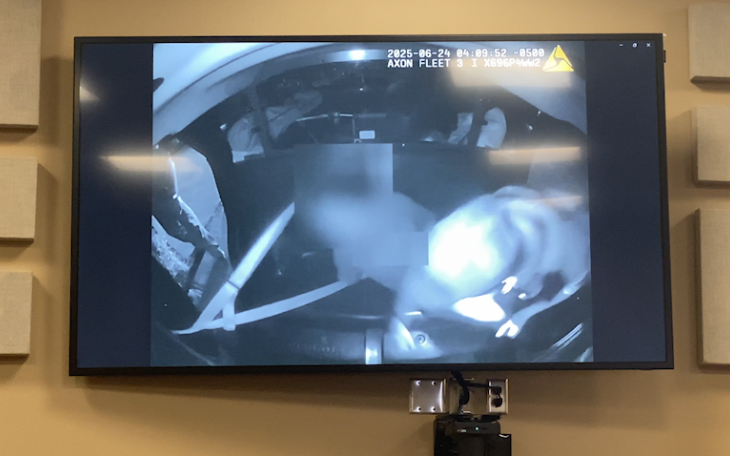 Video of Officer Jason Gann and a restrained woman