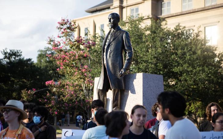Texas A&amp;M University students gather around the statue of former university President Lawrence Sullivan Ross for a protest in defense of academic freedom on Sept. 22, 2025. Texas A&amp;M University System regents on Thursday will vote on a policy that would prohibit faculty from teaching "race and gender ideology."