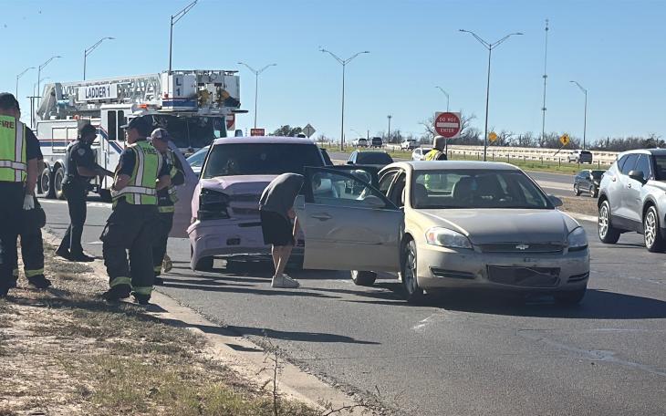 A crash Friday on a Houston Harte frontage road sent two people to the hospital.