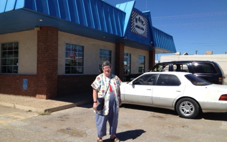 Reid Barnhart enjoys a burger at D-rays Burgers and Dogs on her way home (LIVE! photo by Cheyenne Benson)