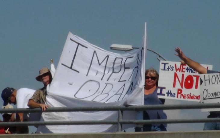 'Overpasses for Obama's Impeachment' held up signs on the Glenna St. overpass (LIVE! photo by Cheyenne Benson)