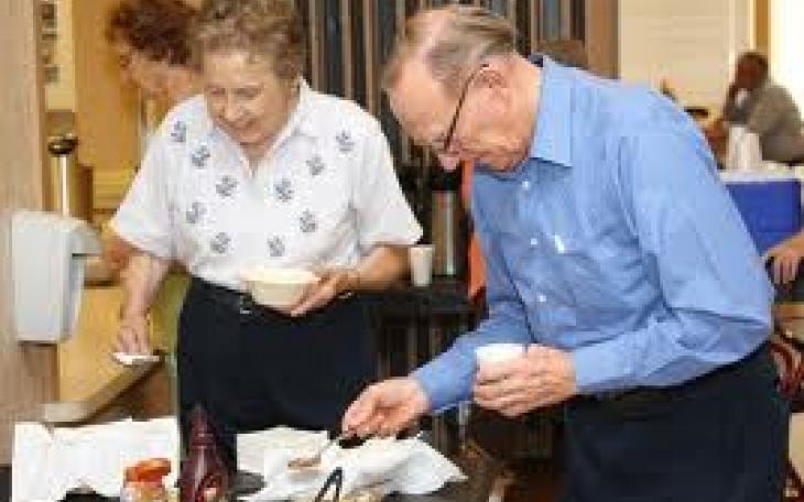 Senior Citizens enjoy lunch (photo courtesy of sanangelotx.us)