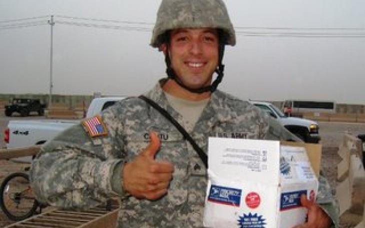 A soldier receives mail (photo courtesy of northwestmilitary.com)