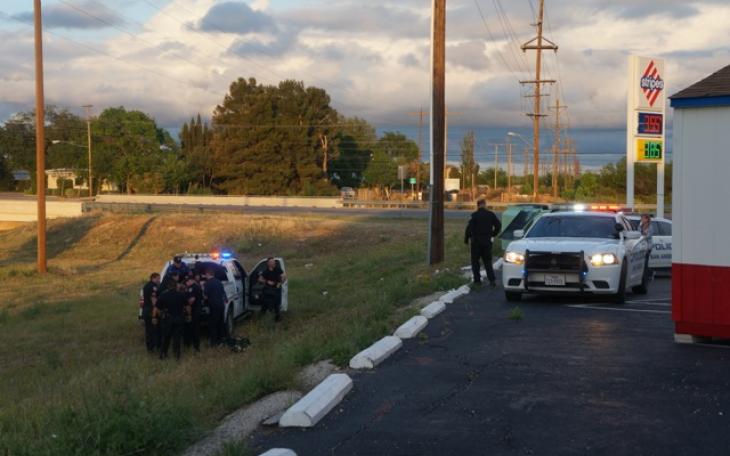 San Angelo police responded to a domestic violence call Easter Sunday and ended up chasing a suspect through the muddy field next to the Stripes on Knickerbocker. (LIVE! Photo/John Basquez)