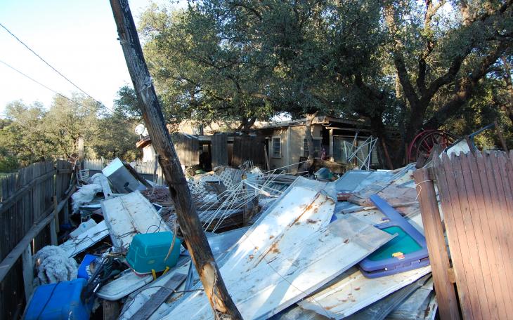 Only up close can you see the house hiding behind piles of junk and scrap in Christoval. (LIVE! Photo by Chelsea Schmid)