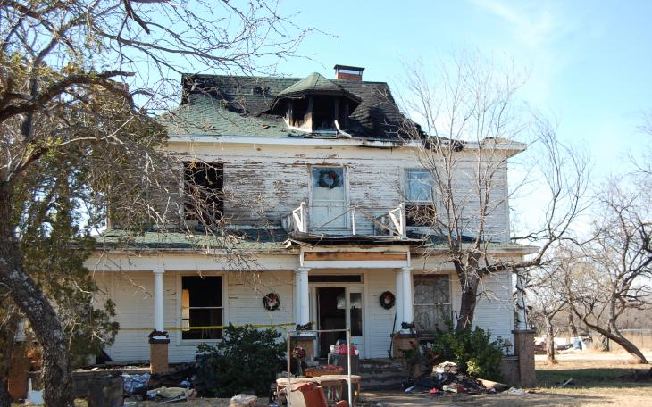 The shell of the Drake family home remains after a severe fire devastated the inside on Wednesday. (LIVE! Photo by John Basquez)
