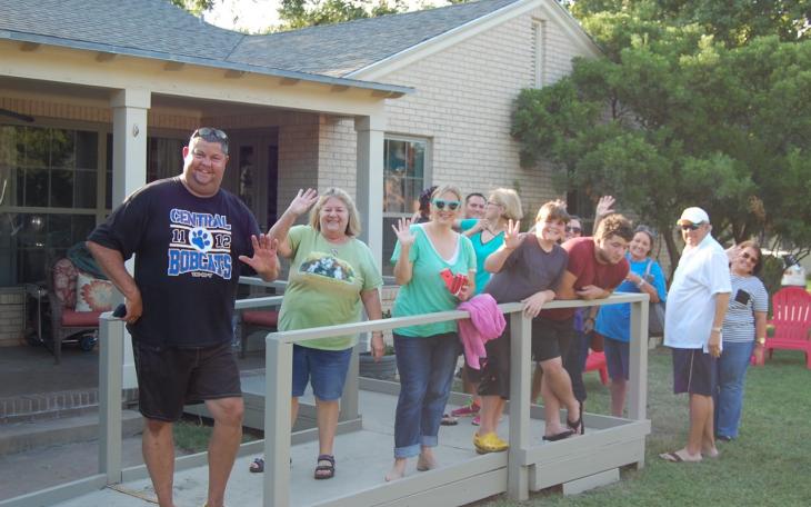 Friends, family and neighbors gathered in front of Mike Ford's house to raise money for funding an ALS cure. (LIVE! Photo/Joe Hyde)