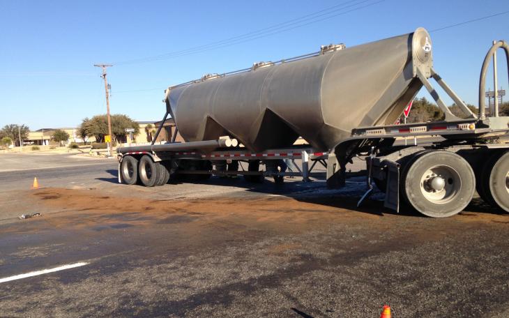 An early morning accident between a white Dodge Caravan and a Peterbilt Semi-truck on U.S. 67 N in from of South Plains Implement. (LIVE! Photo/Joe Hyde)