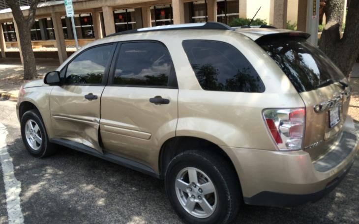 Motorcycle and Equinox collide downtown on August 5, 2014. (LIVE! Photo/John Basquez)