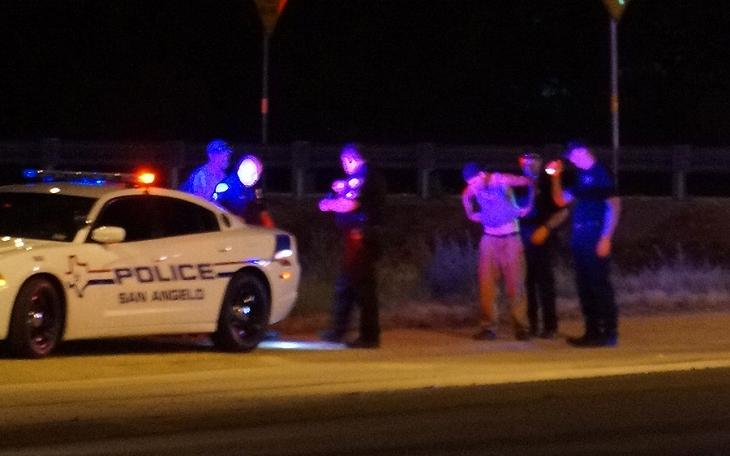 San Angelo police question a person of interest underneath the Houston-Harte overpass at N. Bryant Blvd. (LIVE! Photo/John Basquez)