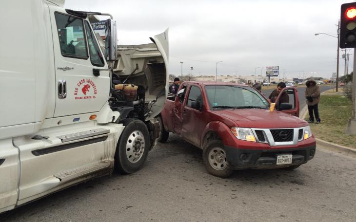 A big rig vs a Nissan on N. Bryant at 23rd on Feb. 23, 2015. (LIVE! Photo/John Basquez)