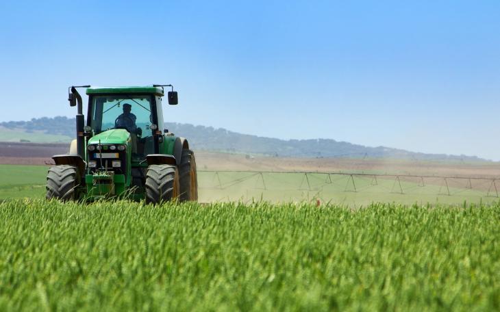 A tractor farming a field. (Contributed)
