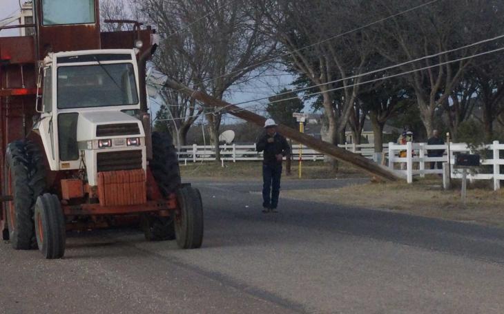 Cotton module builder tears up power pole in Grape Creek on Dec. 28, 2014. (LIVE! Photo/John Basquez)