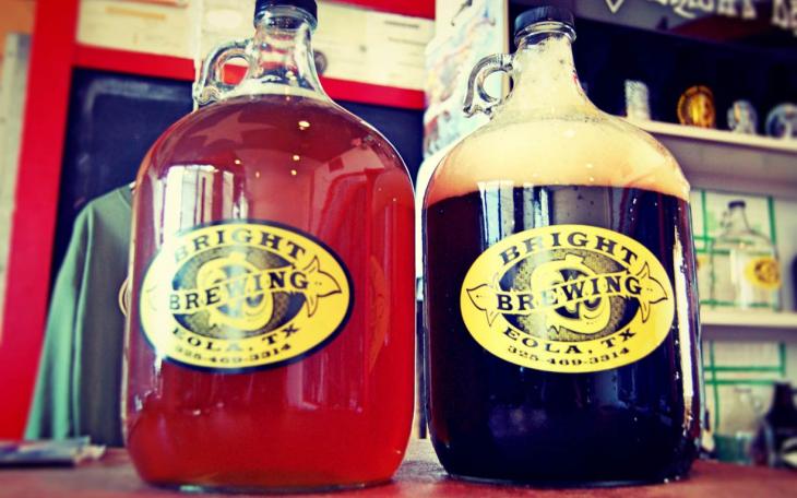 A couple of growlers for sale at the Eola School Brewery. (LIVE! Photo by Chelsea Schmid)
